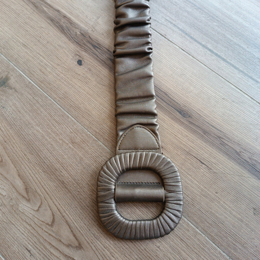 Cinturón elástico bronce