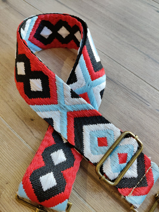 Asa roja- azul claro