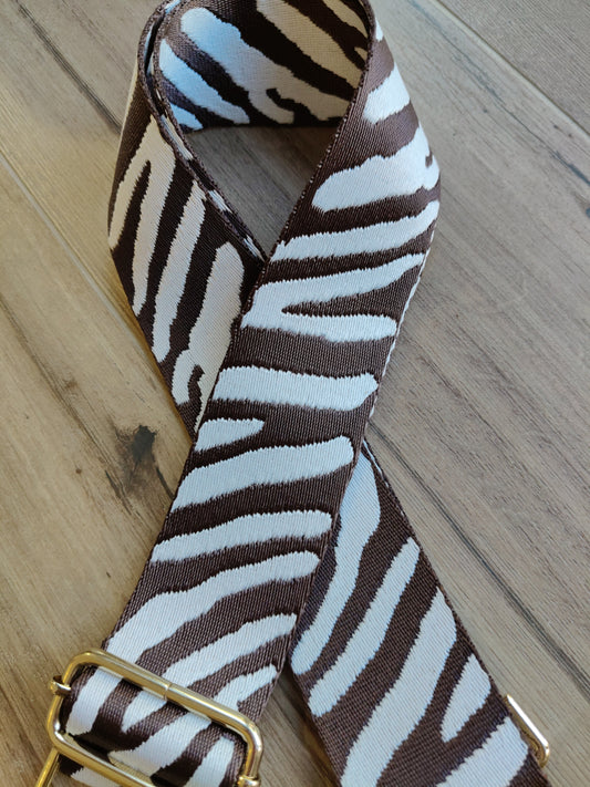 Asa blanca-marrón chocolate