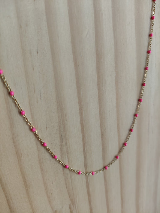 Collar acero bolitas fucsia