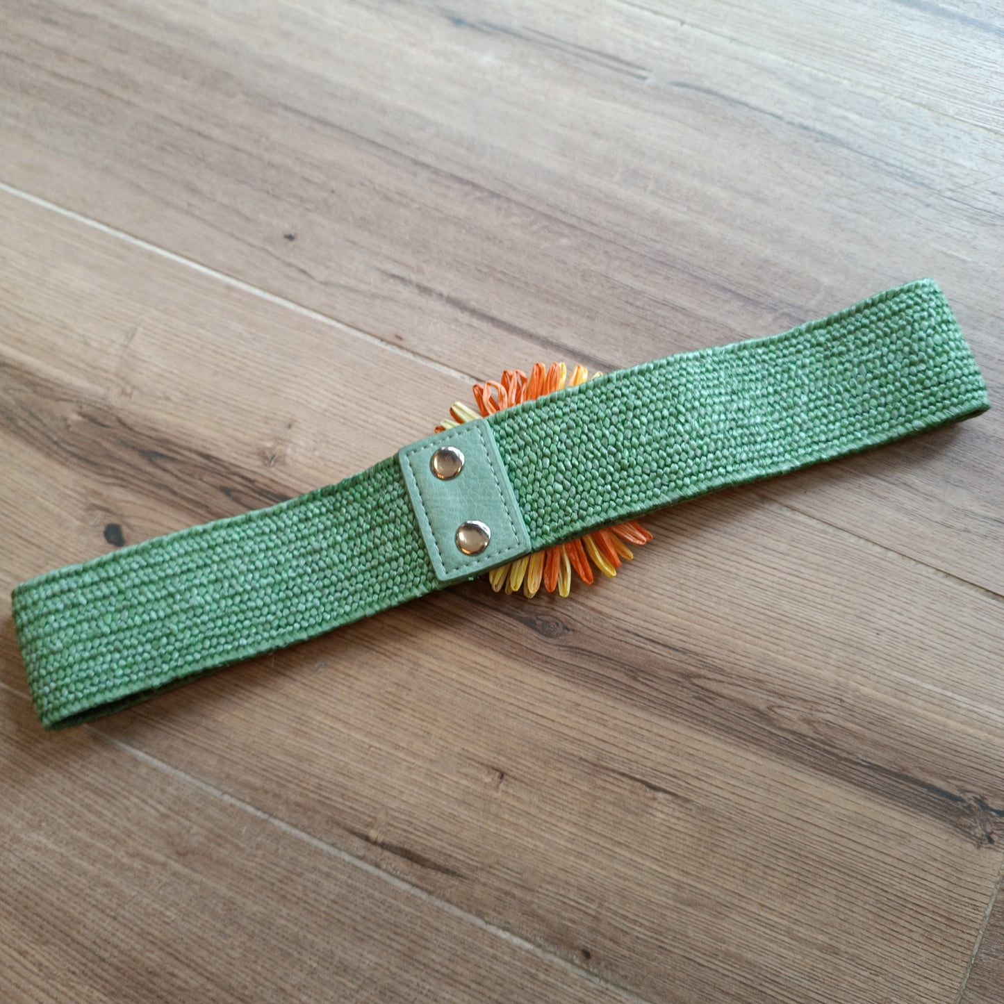 Cinturón elástico verde flor